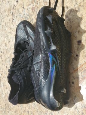 Black Adidas Adizero Football Cleats with Iridescent Accents